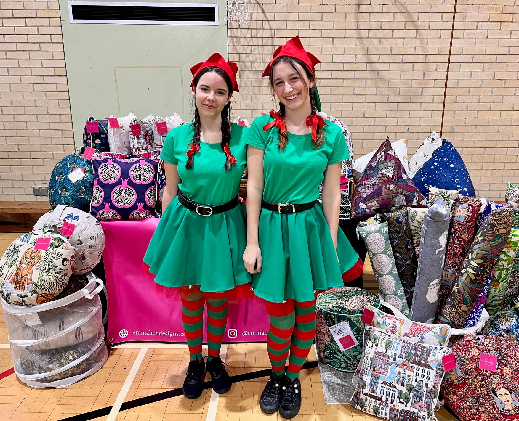 Two girls dressed as elves