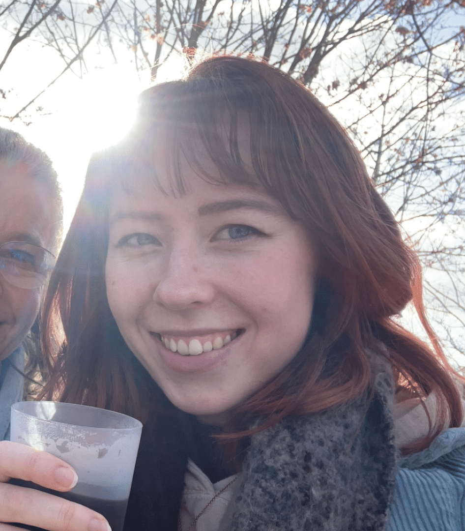 Girl smiling with a drink